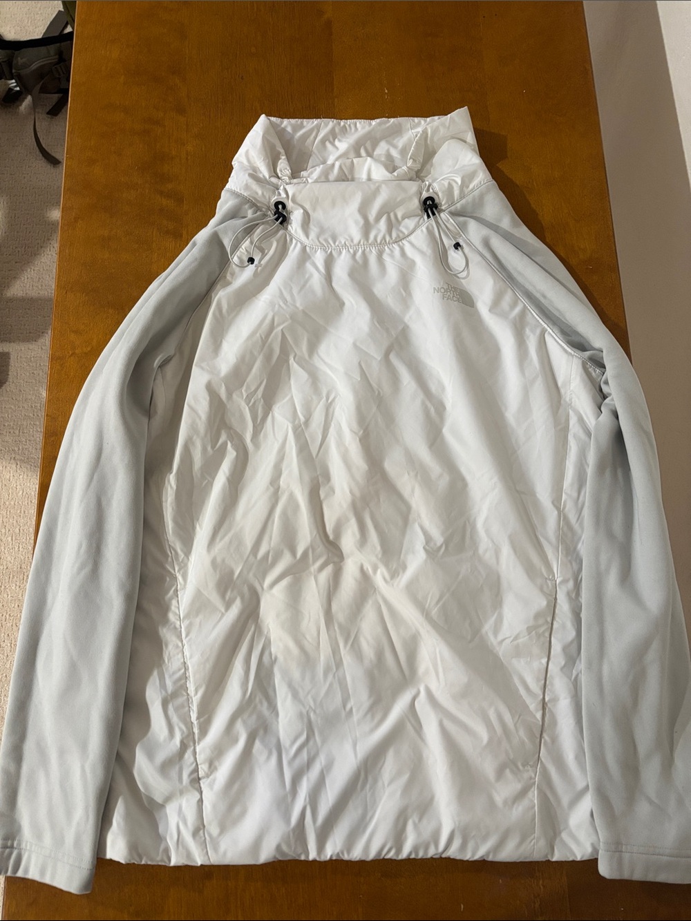The North Face White Women's Pullover Jacket with Black Logo Tag